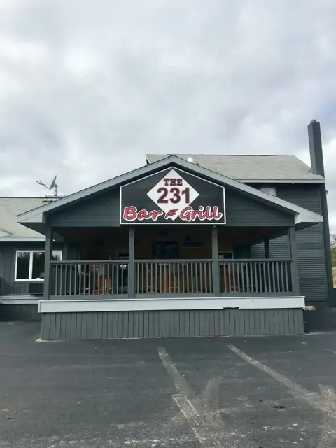 Front of The 231 Bar & Grill building with its diamond sign